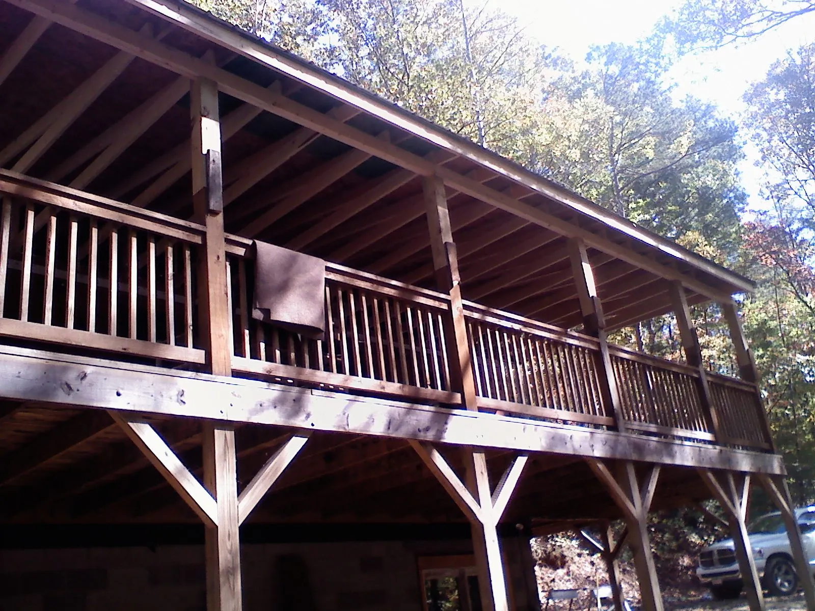 Timber framing under a new elevated porch and deck — Roof Leak Repair in Pomfret by Roofing Brothers